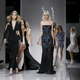 Models present creations by Italian designer Donatella Versace as part of her Haute Couture Spring/Summer 2016 fashion show for Atelier Versace in Paris January 24, 2016. REUTERS/Gonzalo Fuentes - GF20000105801